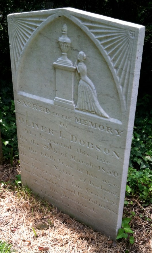 Oliver Dobson's grave exemplifies the Victorian age in which religion was no longer the most prevalent them.