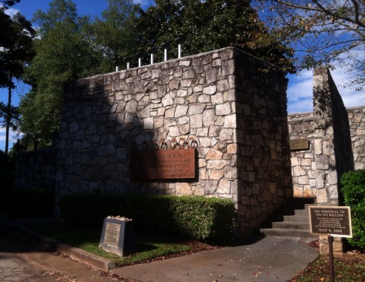 The Memorial for the Six Million is small but impressive. You can see the six white "candles" above the top edge.