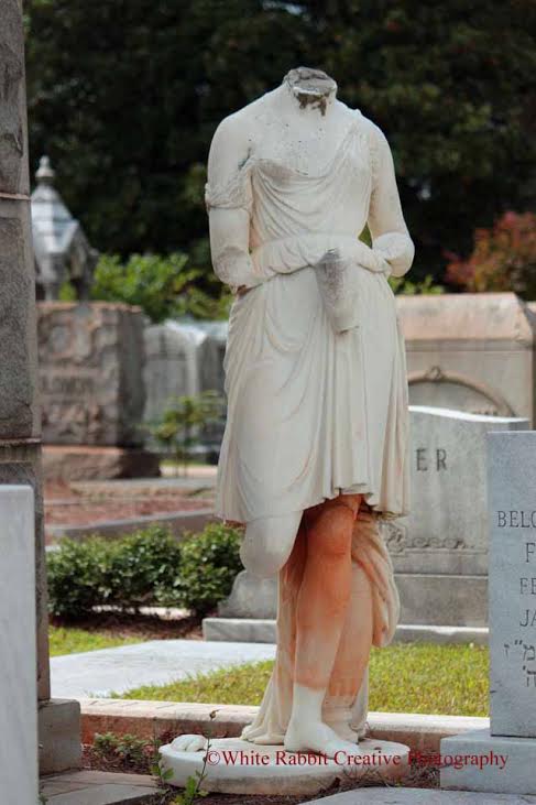 This headless statue holds a mystery. Nobody at Oakland Cemetery really knows her origins and how she ended up this way. All that is known is that she is supposed to represent the Greek goddess, Hebe. 