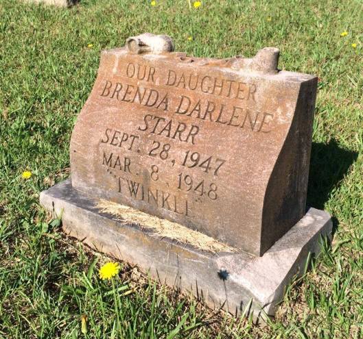 Little Brenda only lived a handful of months before she died. The shoes on top of her grave always get to me.