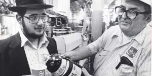 A bottler pours a taste of “kosher for Passover” Diet Coke for a local rabbi in 1983. During Passover, Coke uses a formula free of corn syrup for its kosher Coke. Photo courtesy of Detroit Free Press/Ira Rosenberg.