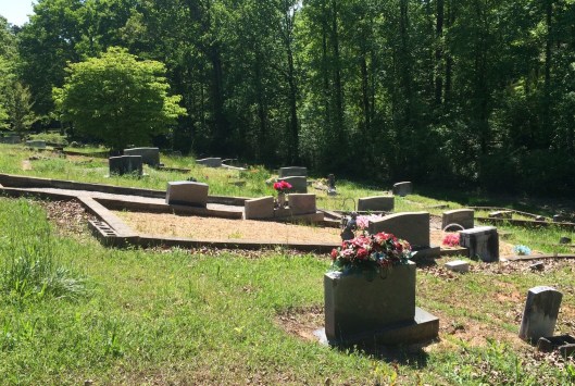 The cemetery is mostly on the side of a hill, so keeping it mowed and weeded is an onerous task.