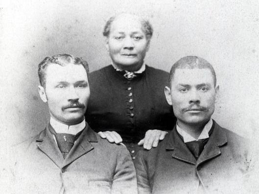 Alonzo Herndon with his mother, Sophenie, and his brother, Thomas, around 1890. Source: The Herndon Home