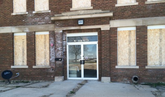 Oddly enough, this former asylum building was low-cost housing for several years before being prepared for demolition. I suspect squatters were still living in it even when we were there because the satellite dish was still in evidence.