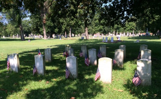 I haven't figured out how two Confederate soldiers ended up among Union troops buried at Magnolia. If you look in the background, you can see seven markers representing Confederate generals buried throughout the cemetery. 